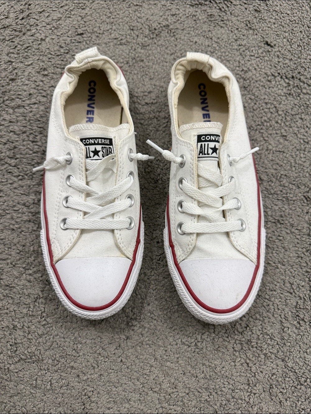 Converse Women's All Star Low Top Sneakers in White with Red Trim